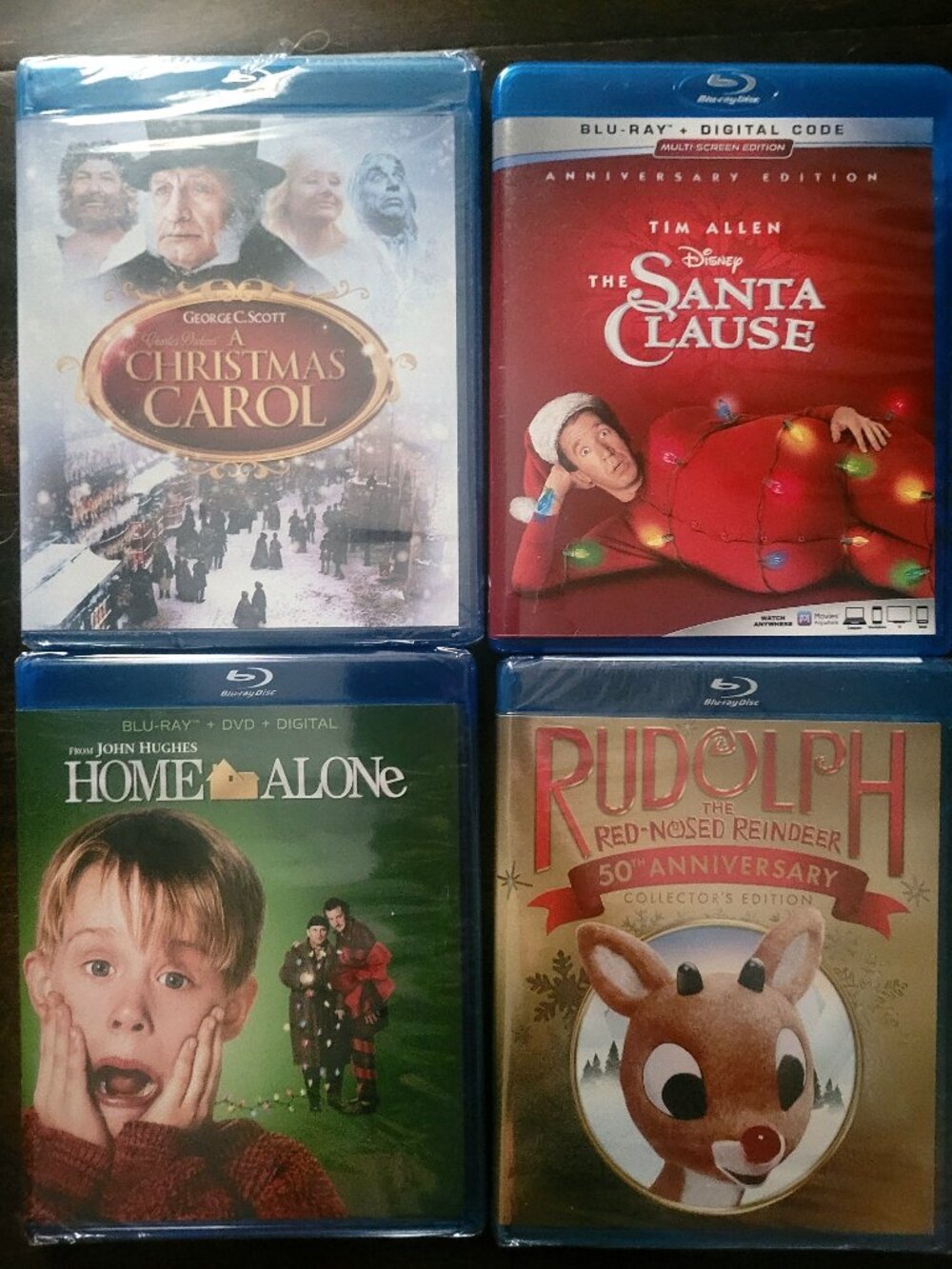 Christmas Movies Blu-ray lot of 4 Home Alone Rudolph Santa Clause Christmas Caro